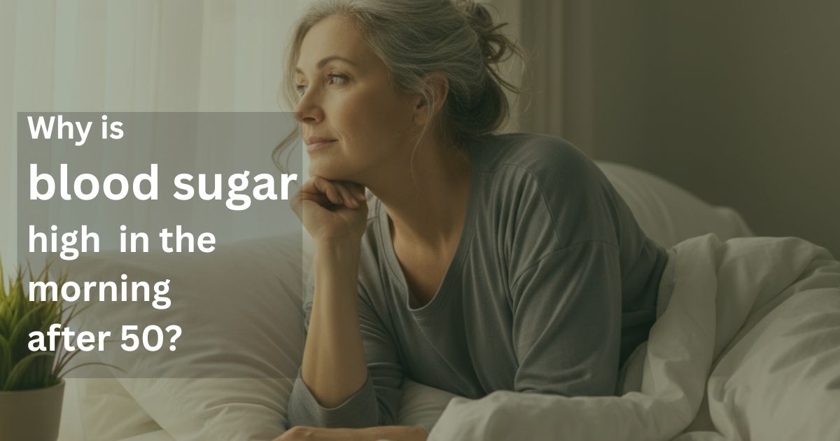 Woman over 50 sitting in bed in soft morning light looking concerned, representing high fasting blood sugar and morning glucose spikes