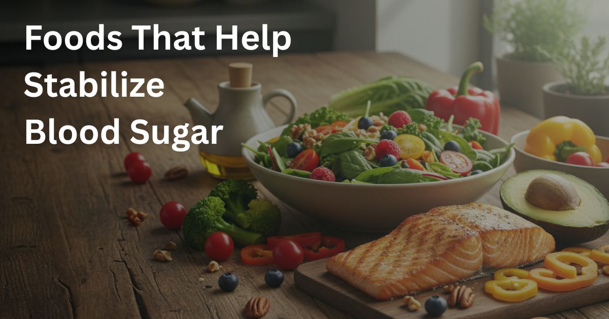 Foods-That-Help-Stabilize-Blood-Sugar-29-1 Healthy meal with salmon, avocado, vegetables, berries, and nuts showing foods that may help support stable blood sugar levels after 50.